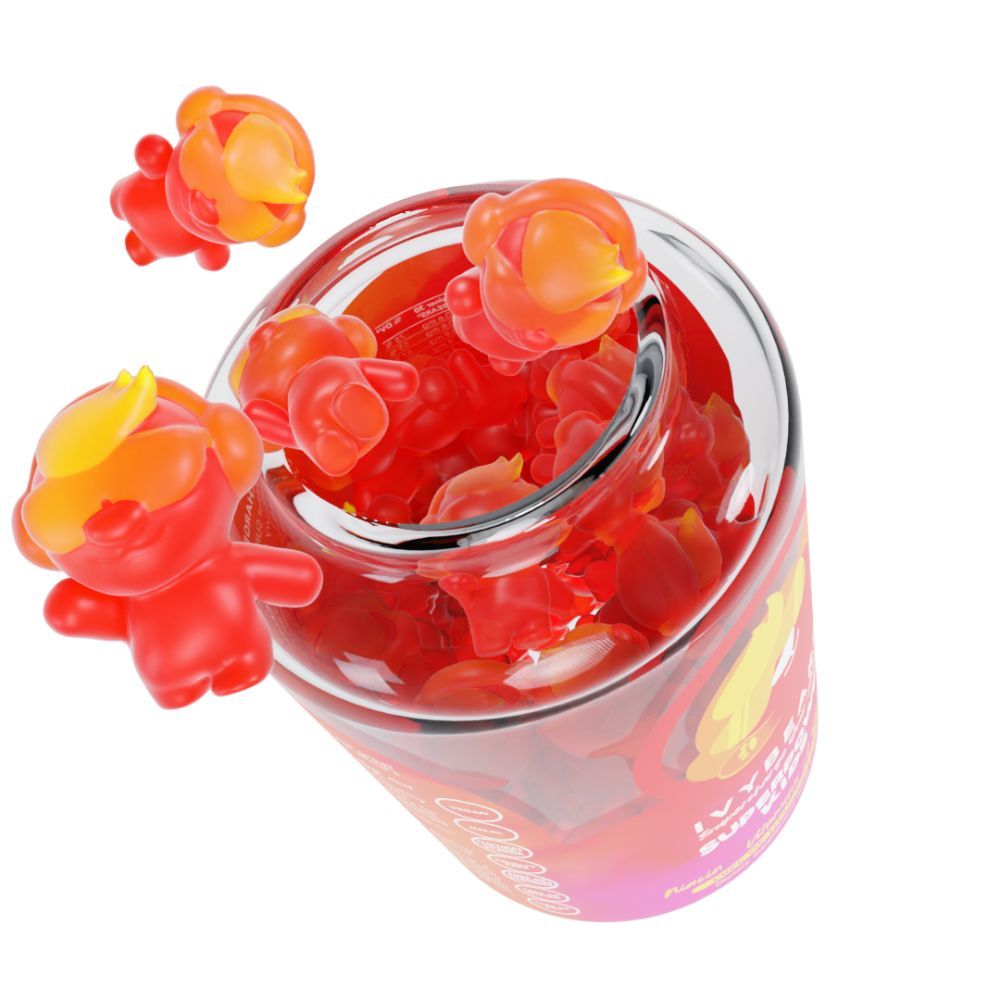 Glasbehälter mit roten und gelben Gummibärchen. Einige Gummibärchen fallen heraus.