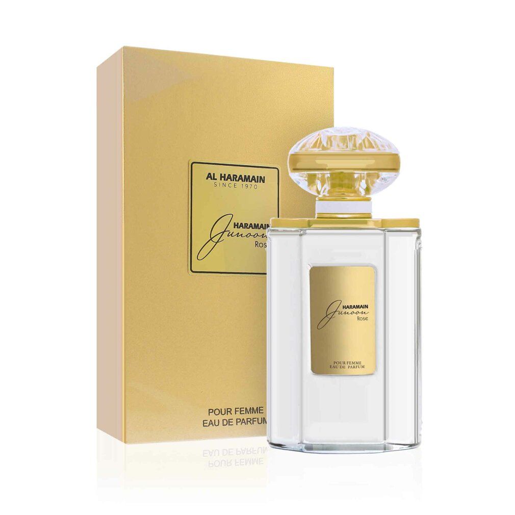 Transparenter Flakon mit goldener Kappe und goldener Verpackung. Aufschrift: Al Haramain Junoon Rose Eau De Parfum.