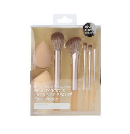 Beauty-Tools-Set mit zwei Schwämmen und fünf Pinseln in transparenter Verpackung.