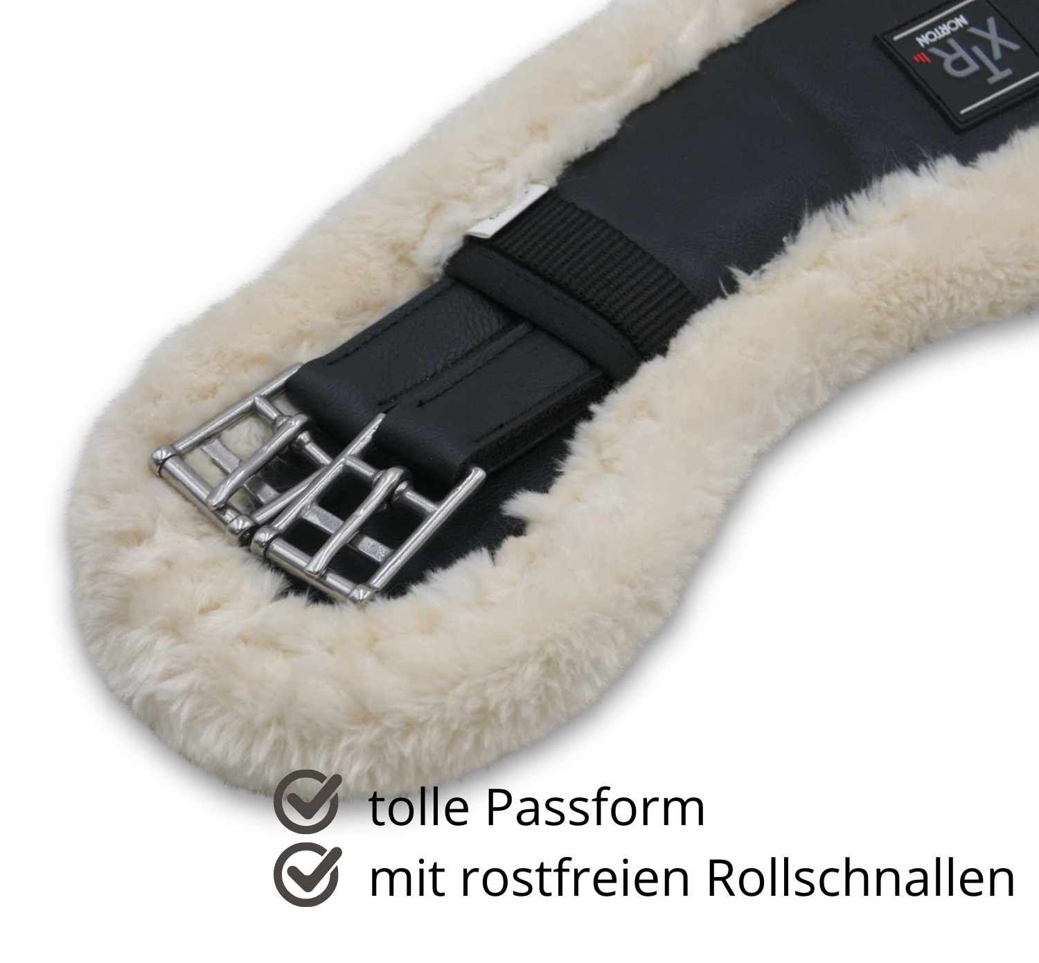 Nahaufnahme des Kurzgurts XTR. Schwarzes Mittelteil, Lammfell, silberne Schnallen. Text: tolle Passform, mit rostfreien Rollschnallen.