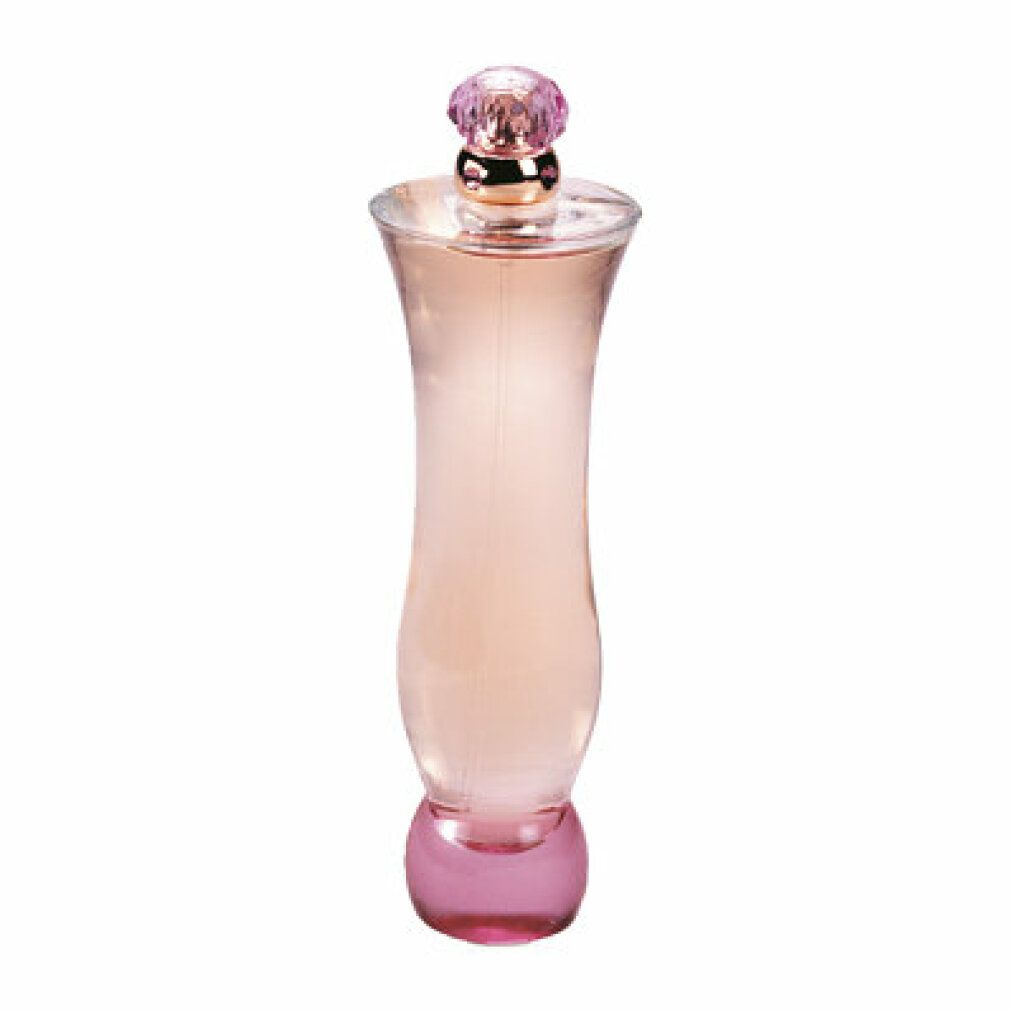 Parfümflakon mit rosa Boden und Verschluss. Der Flakon ist länglich und hat eine rosa-gelbe Flüssigkeit.
