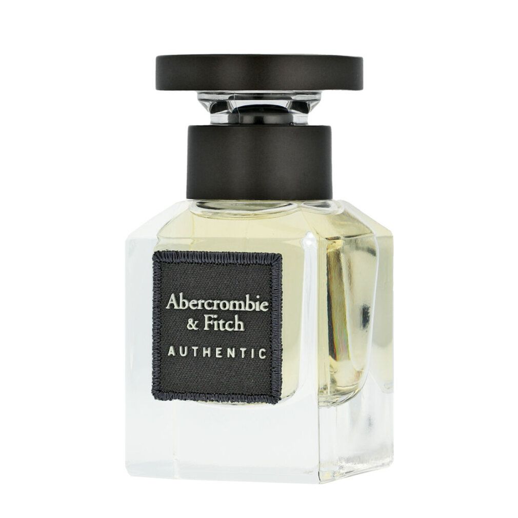 Quadratischer Glasflakon mit schwarzem Verschluss. Schwarzes Etikett mit Aufschrift: Abercrombie & Fitch AUTHENTIC.