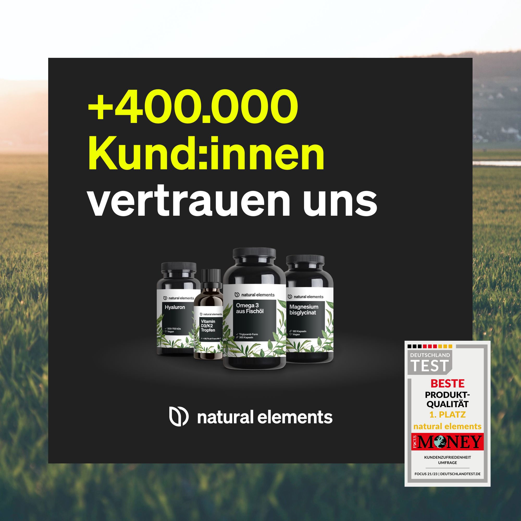 Mehrere Flaschen auf dunklem Hintergrund. Aufschrift: natural elements. Auszeichnung: Beste Produktqualität. Geld-Logo.