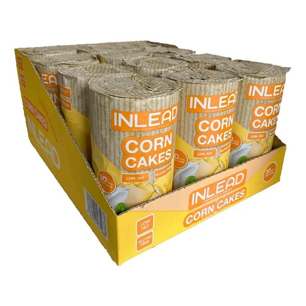 Gelbe Kartonverpackung mit zylindrischen Produkten. Aufdruck: INLEAD Corn Cakes. Glutenfrei, fettarm.