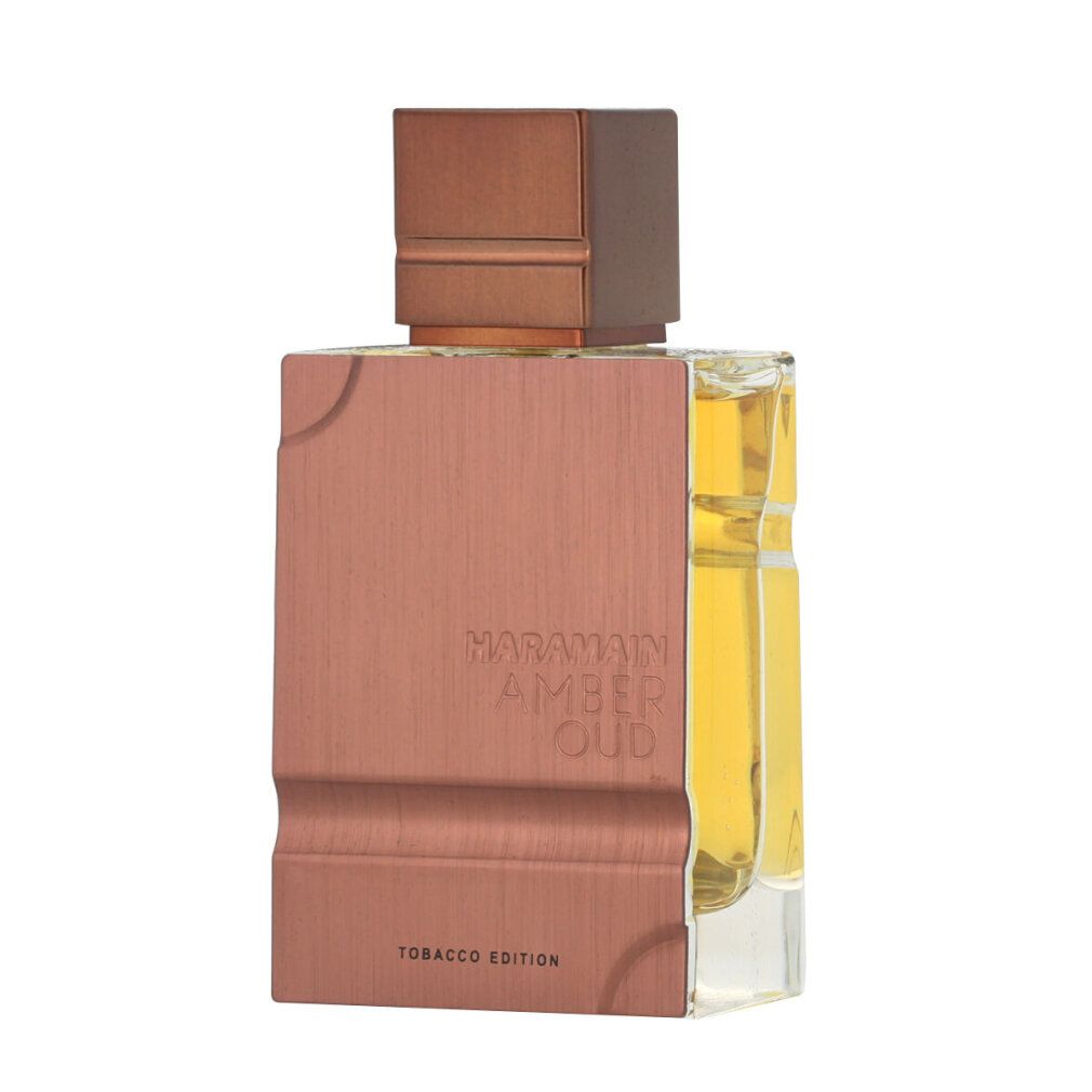 Parfümflasche. Aufschrift: Al Haramain, Amber Oud Tobacco Edition. Flasche in Braun- und Goldtönen.