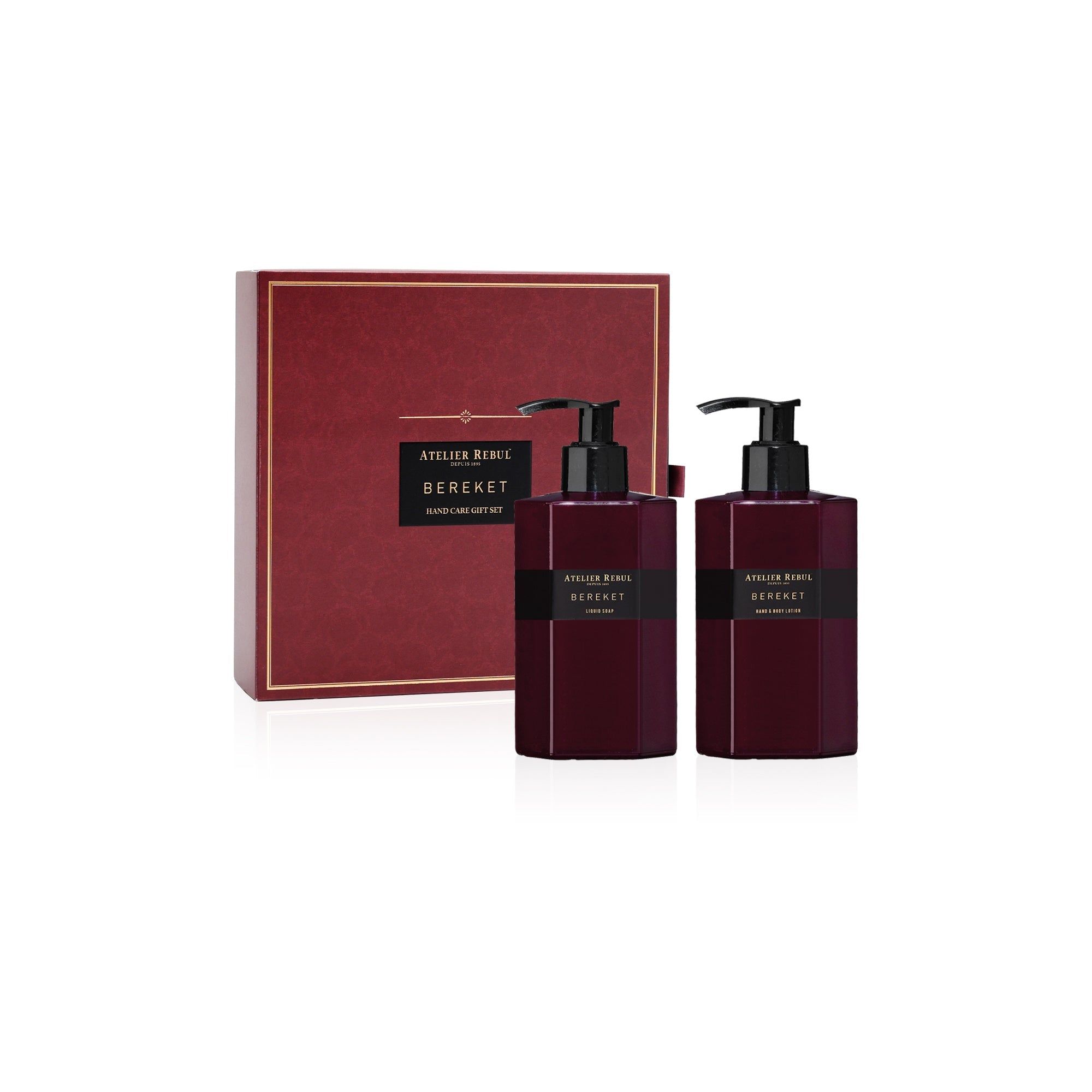 Geschenkset mit zwei Flaschen mit schwarzen Pumpaufsätzen. Rote Box mit Text: Atelier Rebul, Bereket, Hand Care Gift Set. Schwarze Etiketten.