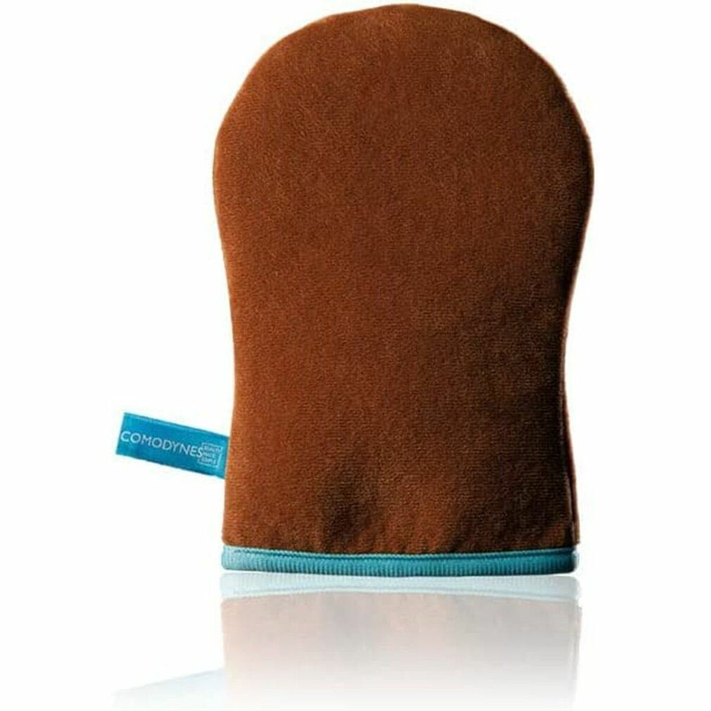 Ein brauner Selbstbräunungshandschuh mit einem blauen Rand und einem kleinen blauen Etikett.
