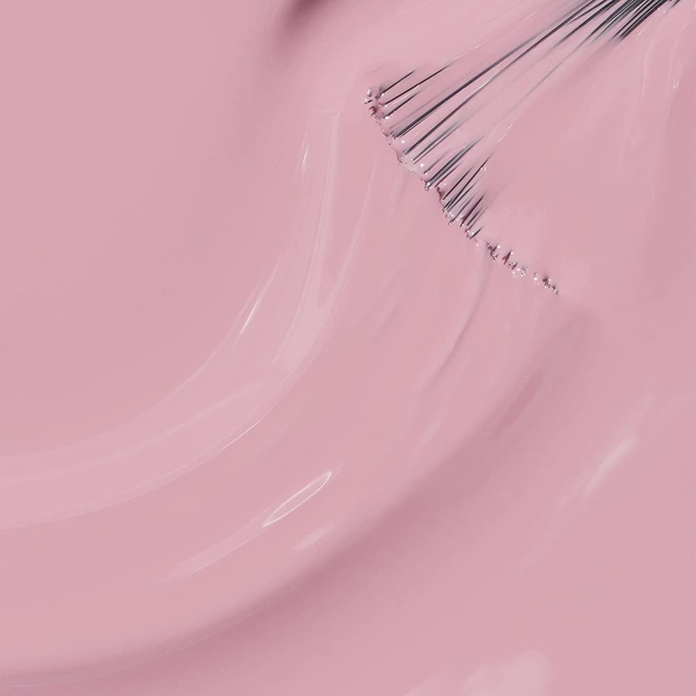 Rosa Nagellack mit Pinsel. Der Pinsel ist in den Lack getaucht und zeigt die Textur. Glänzende Oberfläche.