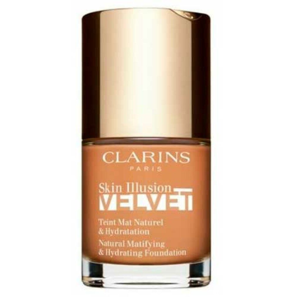 Clarins Skin Illusion Velvet Foundation. Goldfarbener Deckel, braune Flüssigkeit. Text: Natural Matifying & Hydrating Foundation.