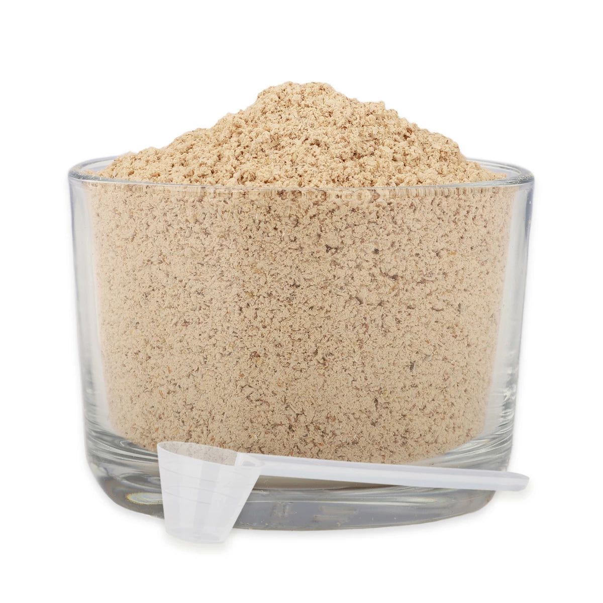 Beige Pulver in Glas, daneben Messlöffel. Keine Produktbezeichnung sichtbar.