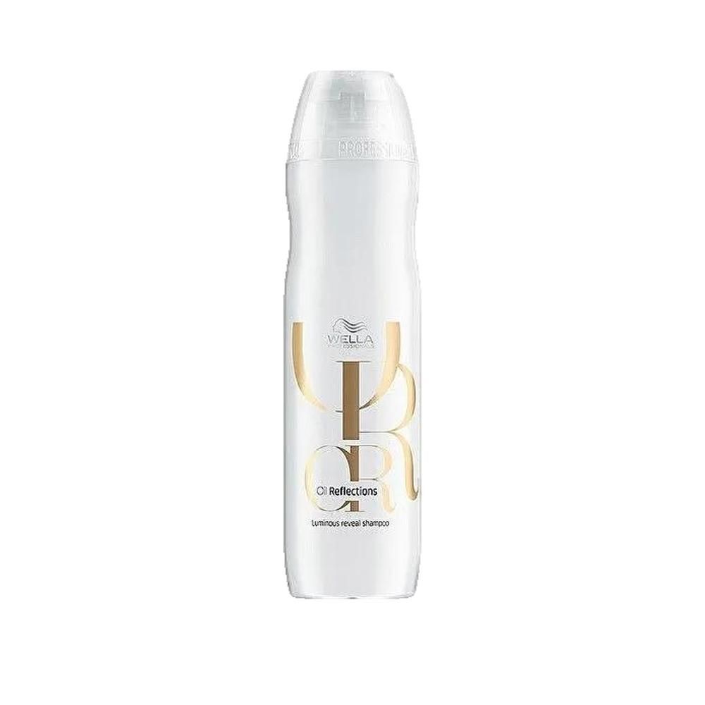 Schlanke, weiße Flasche mit goldfarbenem Logo und Schriftzug. Aufschrift: Wella, Oil Reflections, Luminous Reveal Shampoo.
