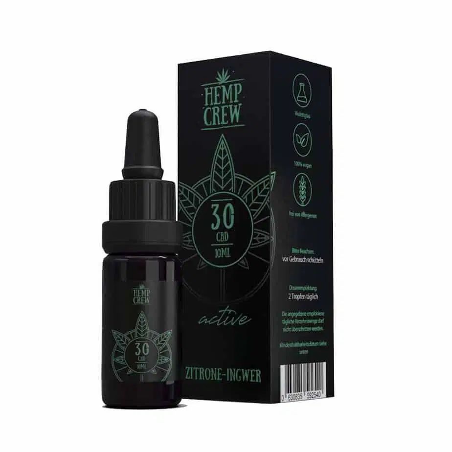 Braune Flasche mit schwarzem Deckel und Pipette. Schwarze Verpackung mit Logo, Text und Zertifizierungen. Produktname: HempCrew Ingwer/Zitrone 30% CBD Öl.