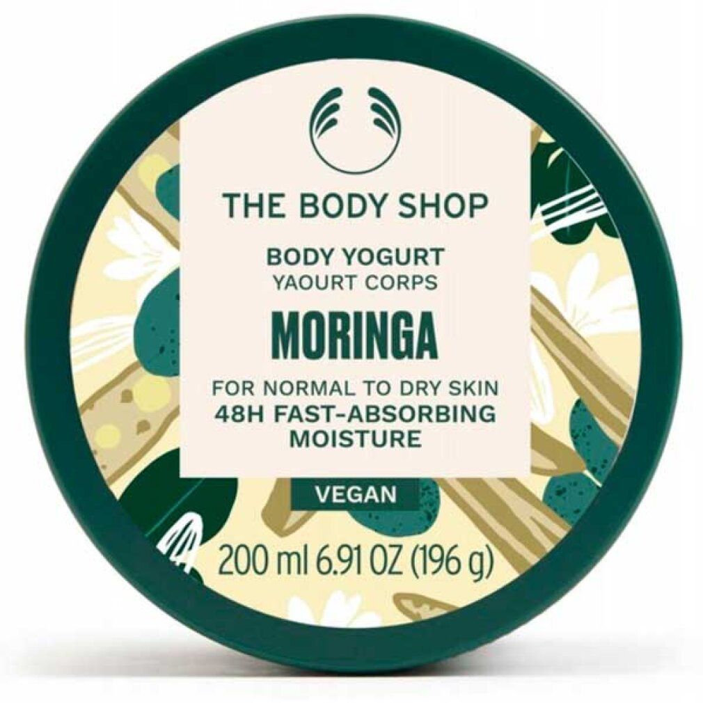 Runder, grüner Behälter mit Deckel. Aufschrift: Body Yogurt Moringa, für normale bis trockene Haut, 48h Feuchtigkeit. Vegan. 200 ml.