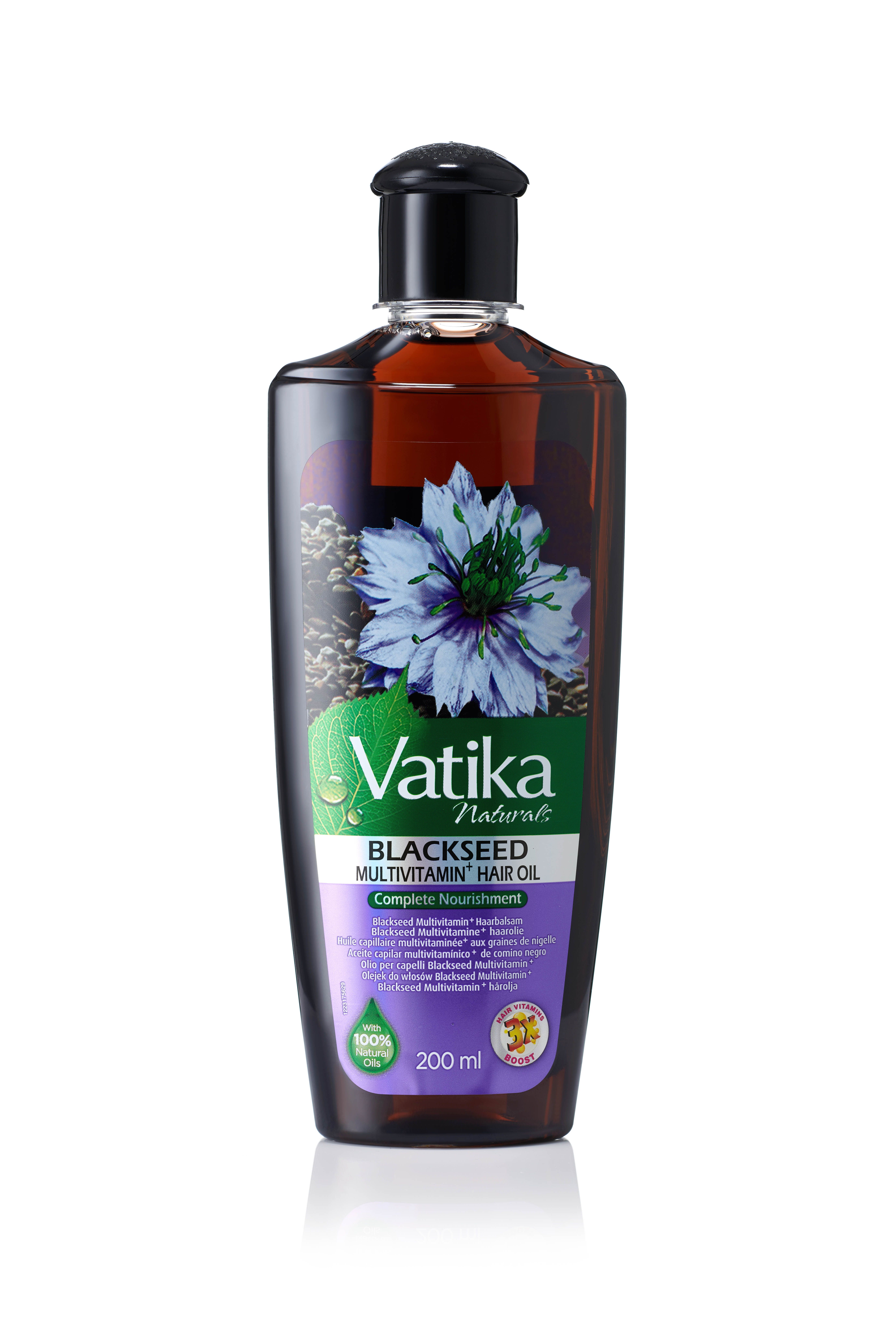 Vatika Naturals Schwarzkümmel Haaröl. Braune Flasche mit schwarzem Deckel. Etikett mit Logo, Blüte und Text. 200 ml.