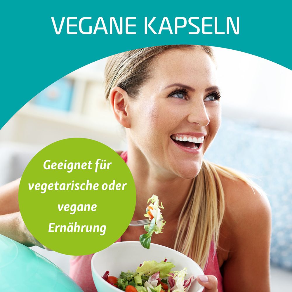Eine Frau isst Salat. Text: Vegane Kapseln. Geeignet für vegetarische oder vegane Ernährung.