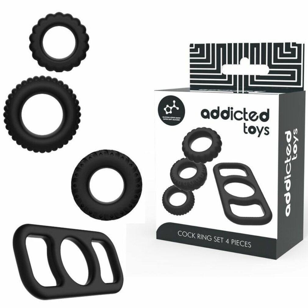 Verpackung mit vier schwarzen Penisringen aus Silikon. Marke Addicted Toys. Enthält Ringe mit verschiedenen Designs.