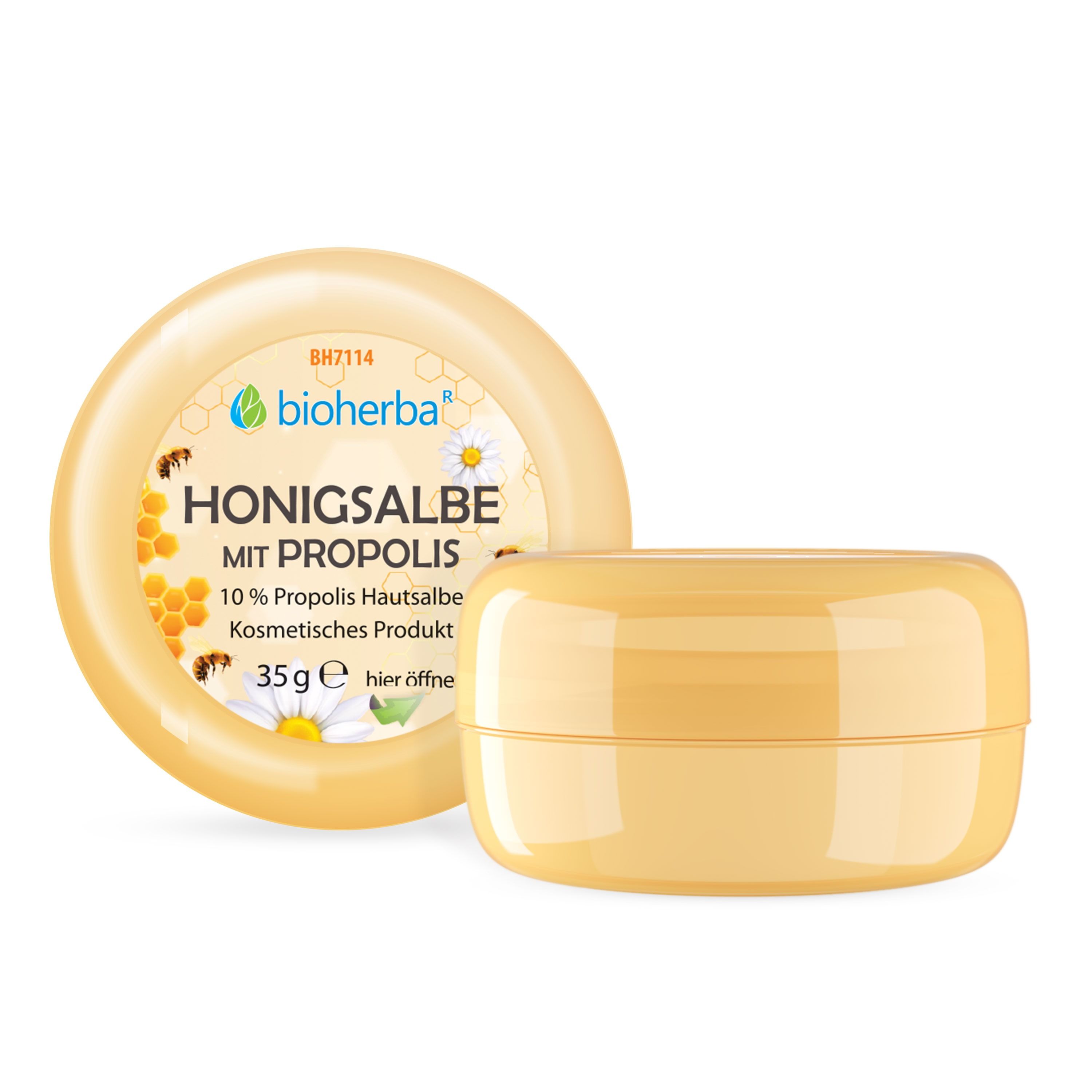 Geöffnete Dose Honigsalbe mit Propolis. Deckel mit Produktname, Bienen, Kamille. Gelbe Dose.