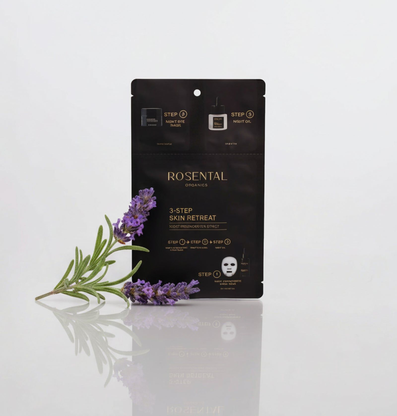 Schwarze Verpackung mit Produktnamen und 3-Step Skin Retreat. Lavendelzweig liegt daneben.