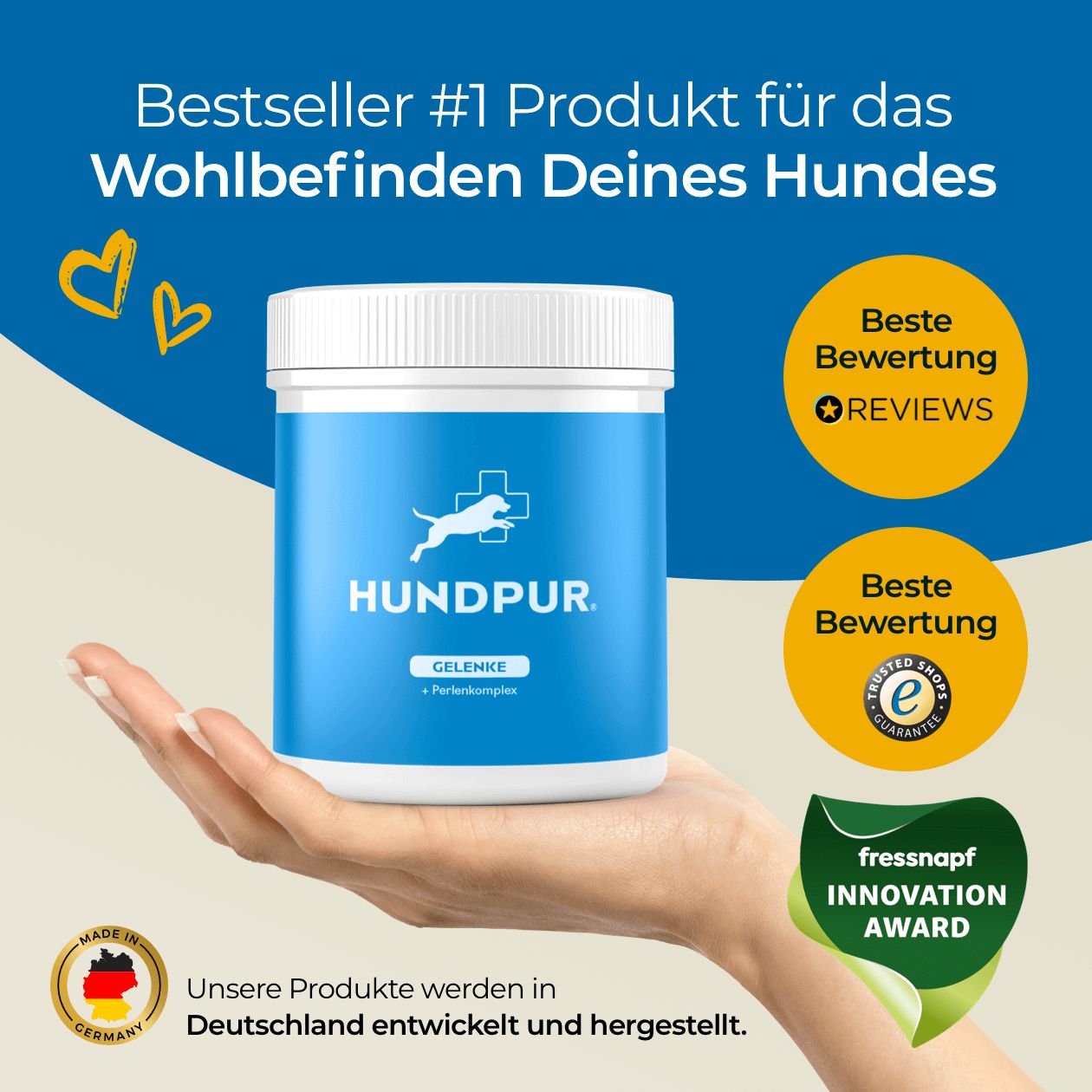 Hand hält blaue Dose mit "HUNDPUR"-Logo. Text: "Gelenke + Perlenkomplex". Auszeichnungen: "Beste Bewertung", "Trusted Shops", "Innovation Award".