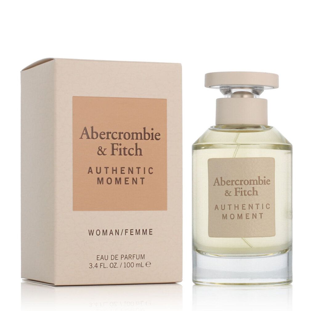 Parfümflakon und Verpackung. Aufschrift: Abercrombie & Fitch, Authentic Moment. Woman/Femme. Eau de Parfum.