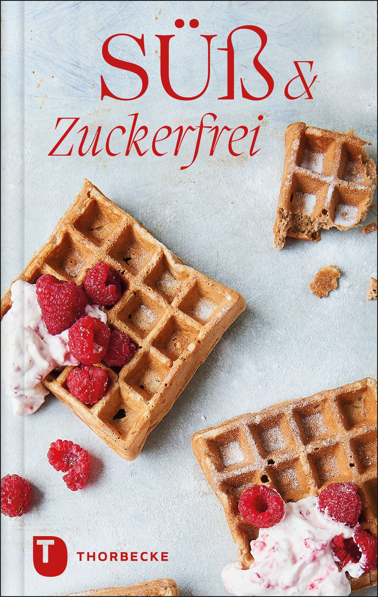 Buchcover mit Titel „Süß & zuckerfrei“. Waffeln mit Himbeeren und Creme. Verlag Thorbecke.