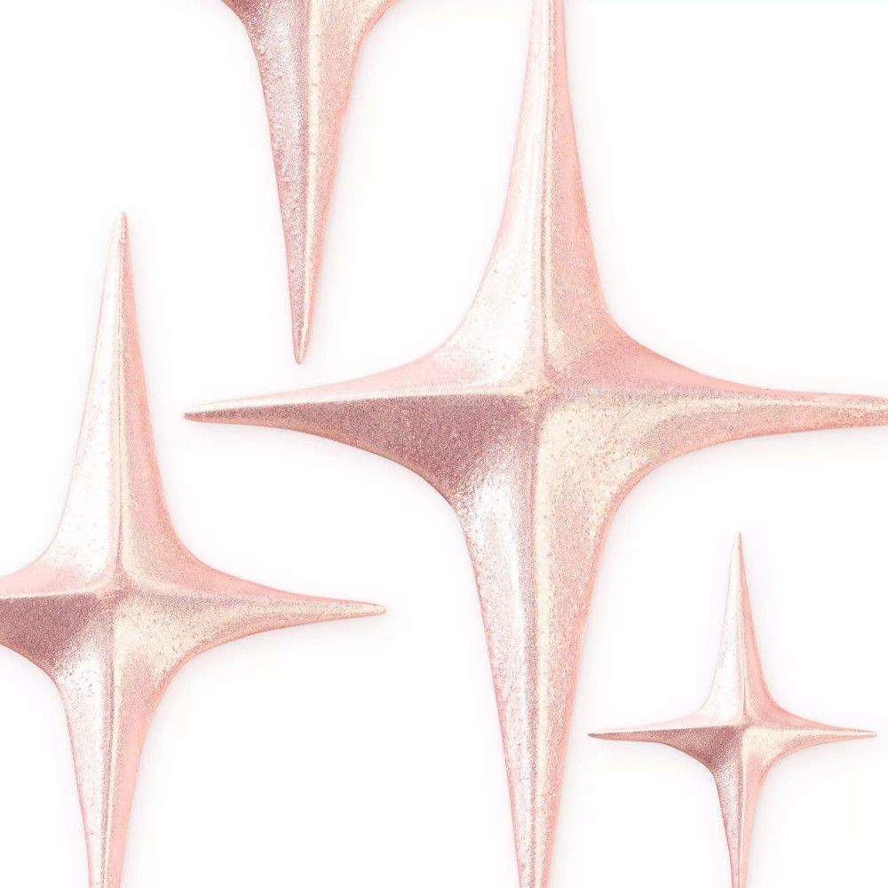 Rosa glitzernde Sterne auf weißem Hintergrund. Verschiedene Größen und Formen. Glitzer-Effekt.