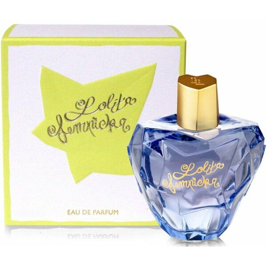 Lolita Lempicka Eau de Parfum Flakon und Schachtel. Blauer Flakon, goldener Deckel. Gelbe Stern-Schachtel.