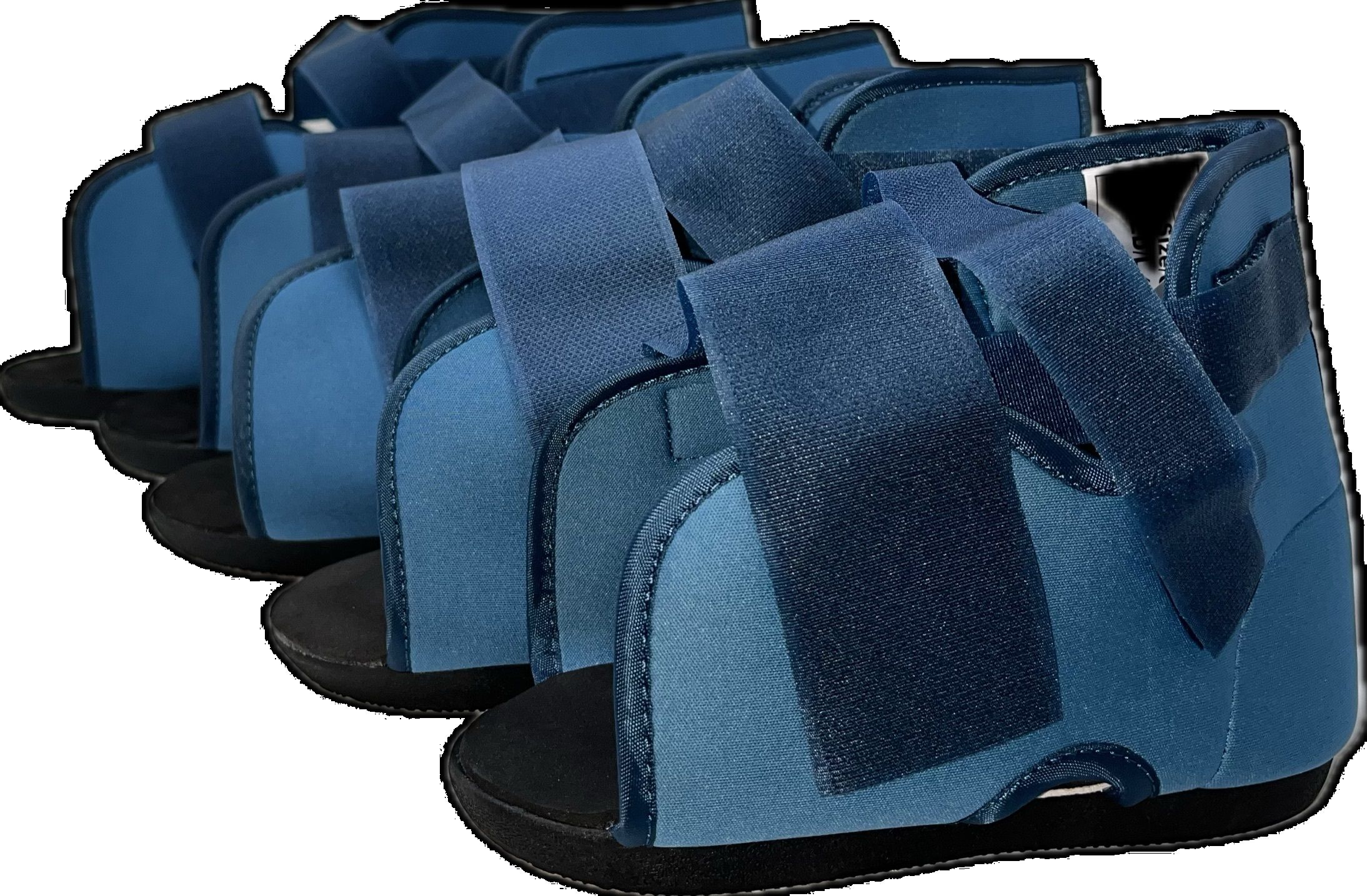 Mehrere blaue Artistep S Gehschuhe. Knöchelhohe Schuhe mit Klettverschlüssen. Schwarze Sohlen. Perspektivische Ansicht.