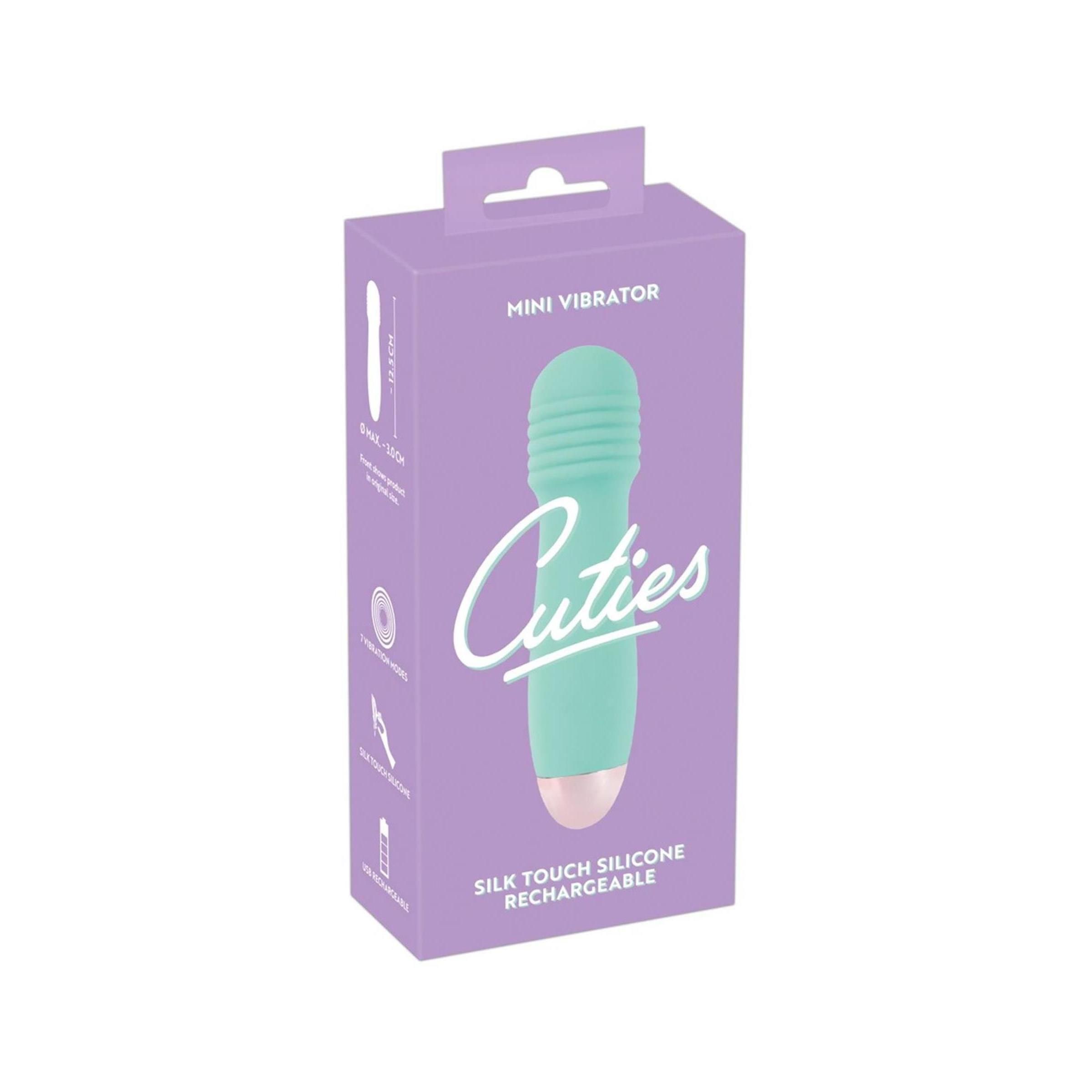 Verpackung für Mini Vibrator. Produktname 'Cuties' und Produktmerkmale sichtbar.
