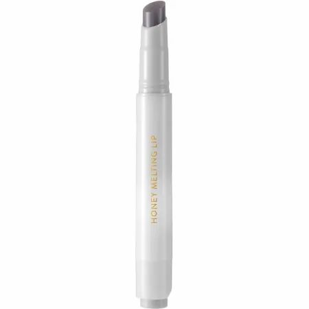 Weißer Lippenstift mit grauer Spitze. Aufschrift "HONEY MELTING LIP".