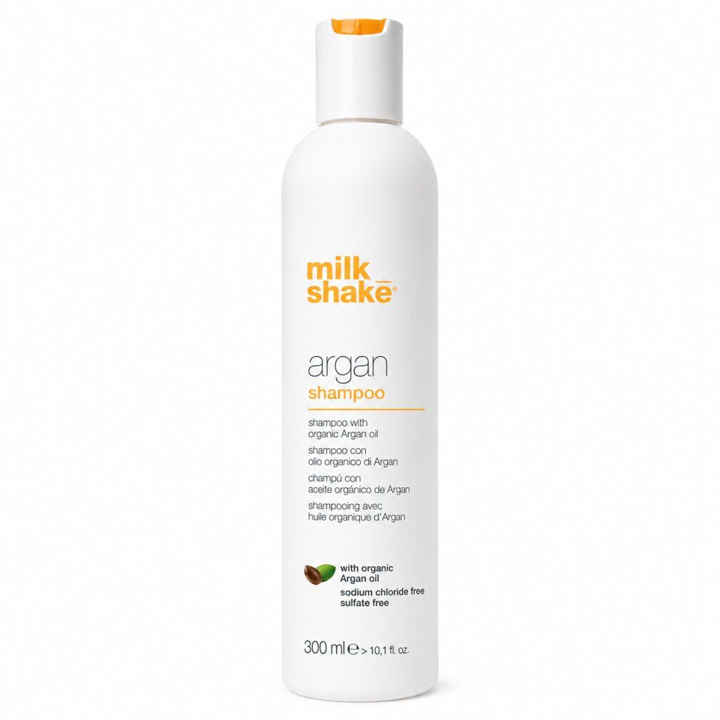 Weiße Flasche Milk Shake Argan Shampoo mit orangefarbenem Deckel. Enthält 300 ml.