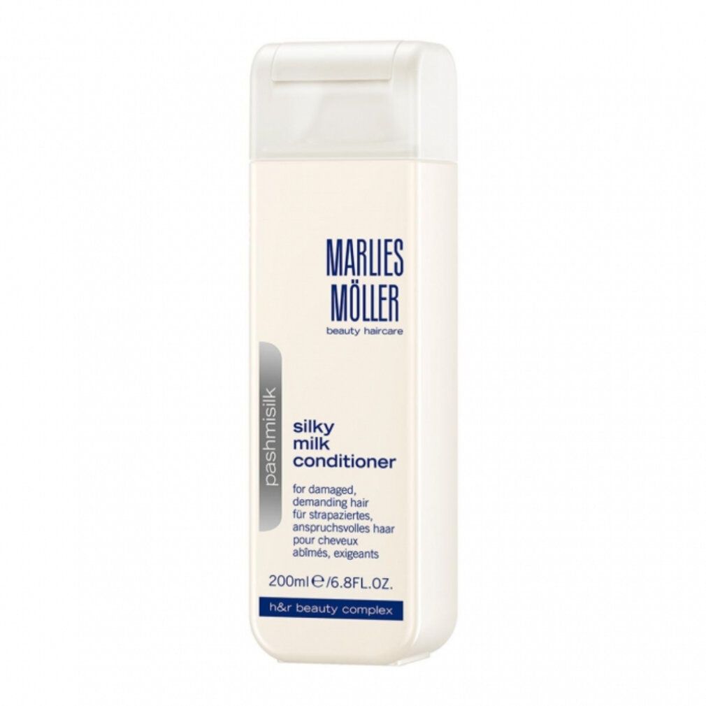 Rechteckige, weiße Flasche. Aufschrift: Marlies Möller, Silky Milk Conditioner. Text in Deutsch, Französisch, Englisch.