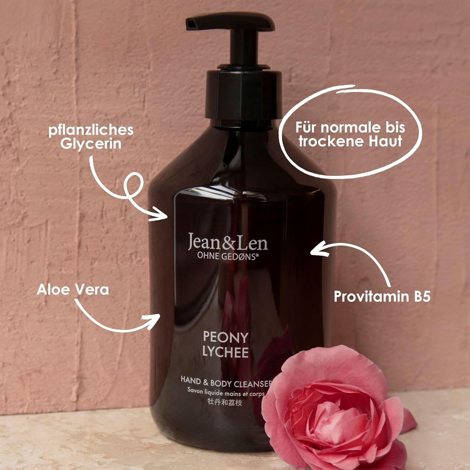 Braune Flasche mit schwarzem Pumpkopf. Aufschrift: Jean & Len, Peony Lychee, Hand & Body Cleanser. Mit Aloe Vera, Glycerin, Provitamin B5.
