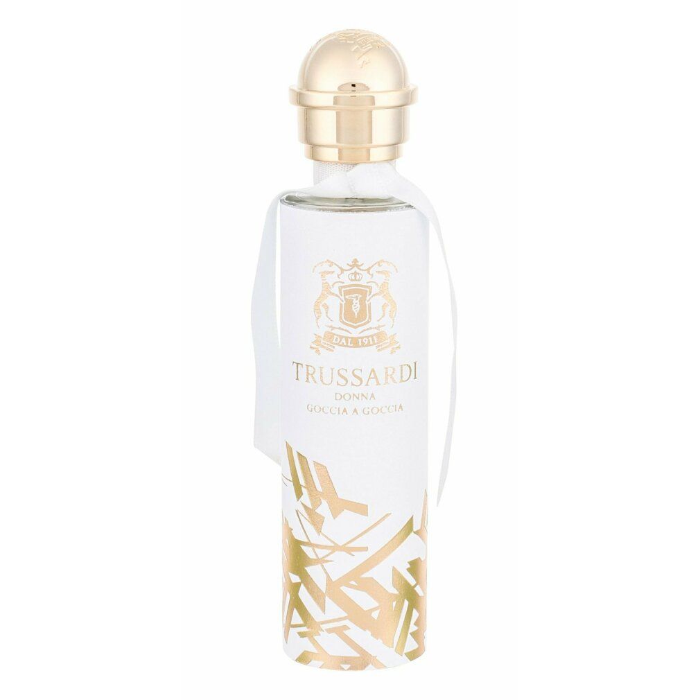 Parfümflasche mit weißem Etikett und goldenem Logo. Marke: Trussardi Donna Goccia a Goccia. Goldener Deckel und weißes Band.
