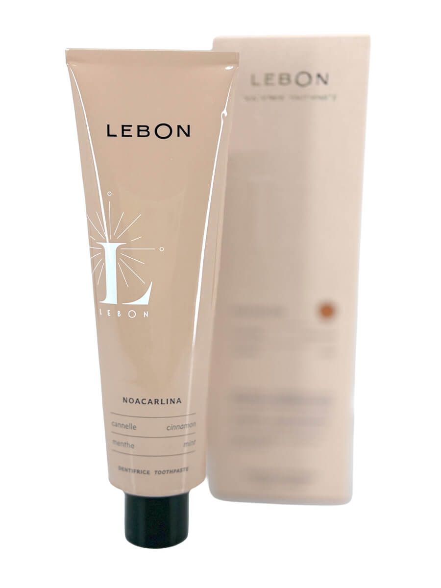 Zahnpasta-Tube LEBON NOACARLINA und Verpackung. Beide in Rosa gehalten.