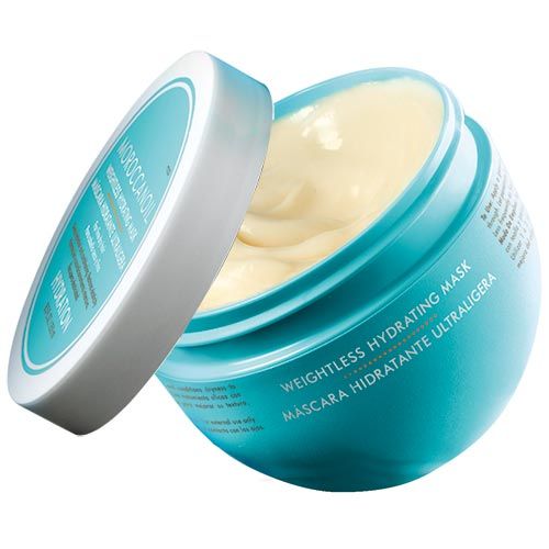 Türkis-weißer Tiegel, Deckel geöffnet. Aufschrift: Moroccanoil, Weightless Hydrating Mask, Mascara Hidratante Ultraligera, Hydration.