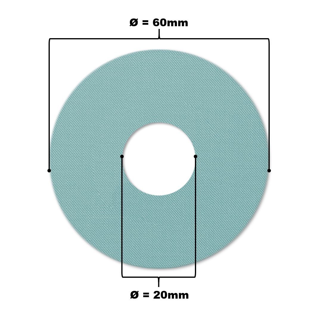 Hellblaues Katheterpflaster mit Loch. Durchmesser 60mm, Lochdurchmesser 20mm.