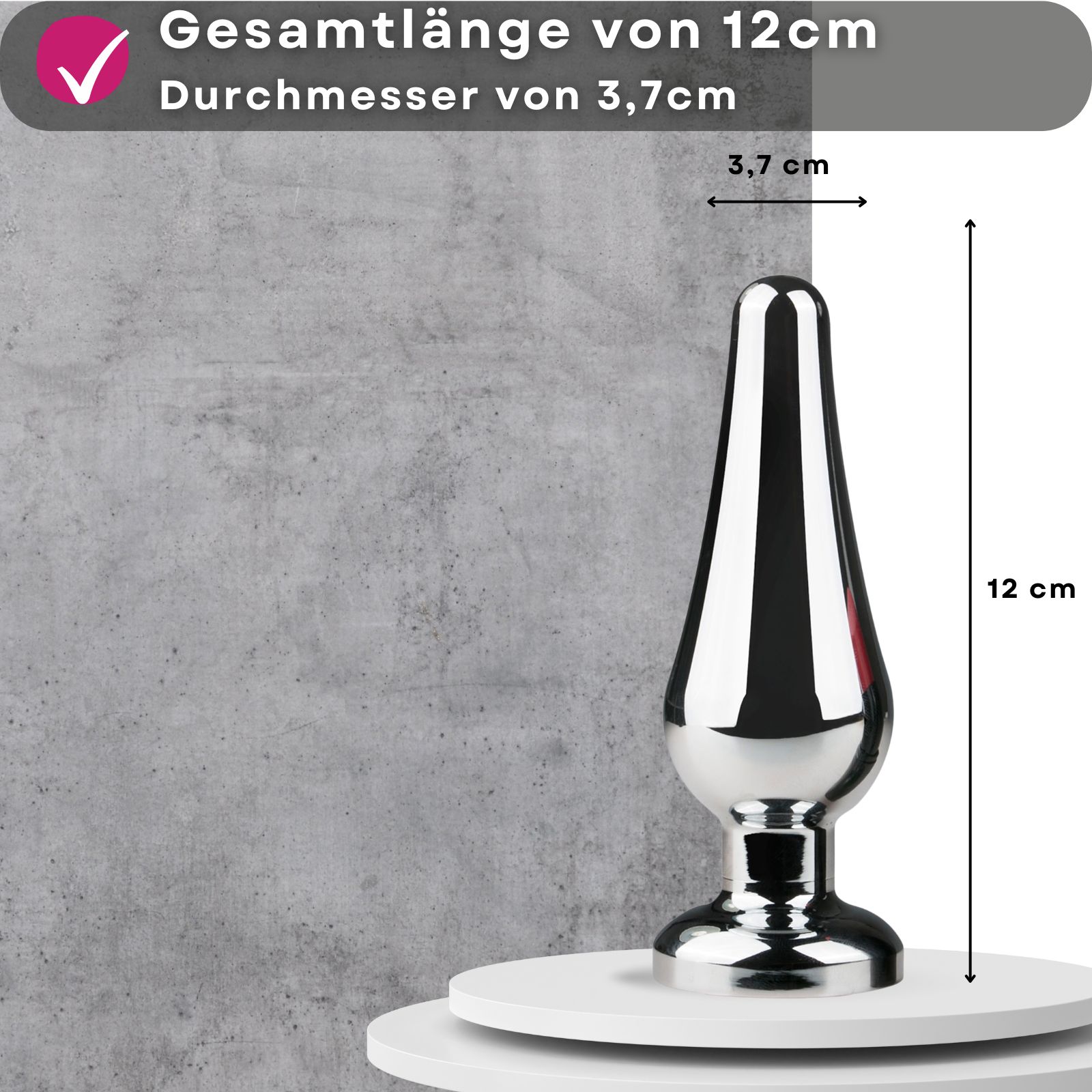 Silberfarbener, kegelförmiger Analplug aus Metall. 12 cm lang, 3,7 cm Durchmesser.