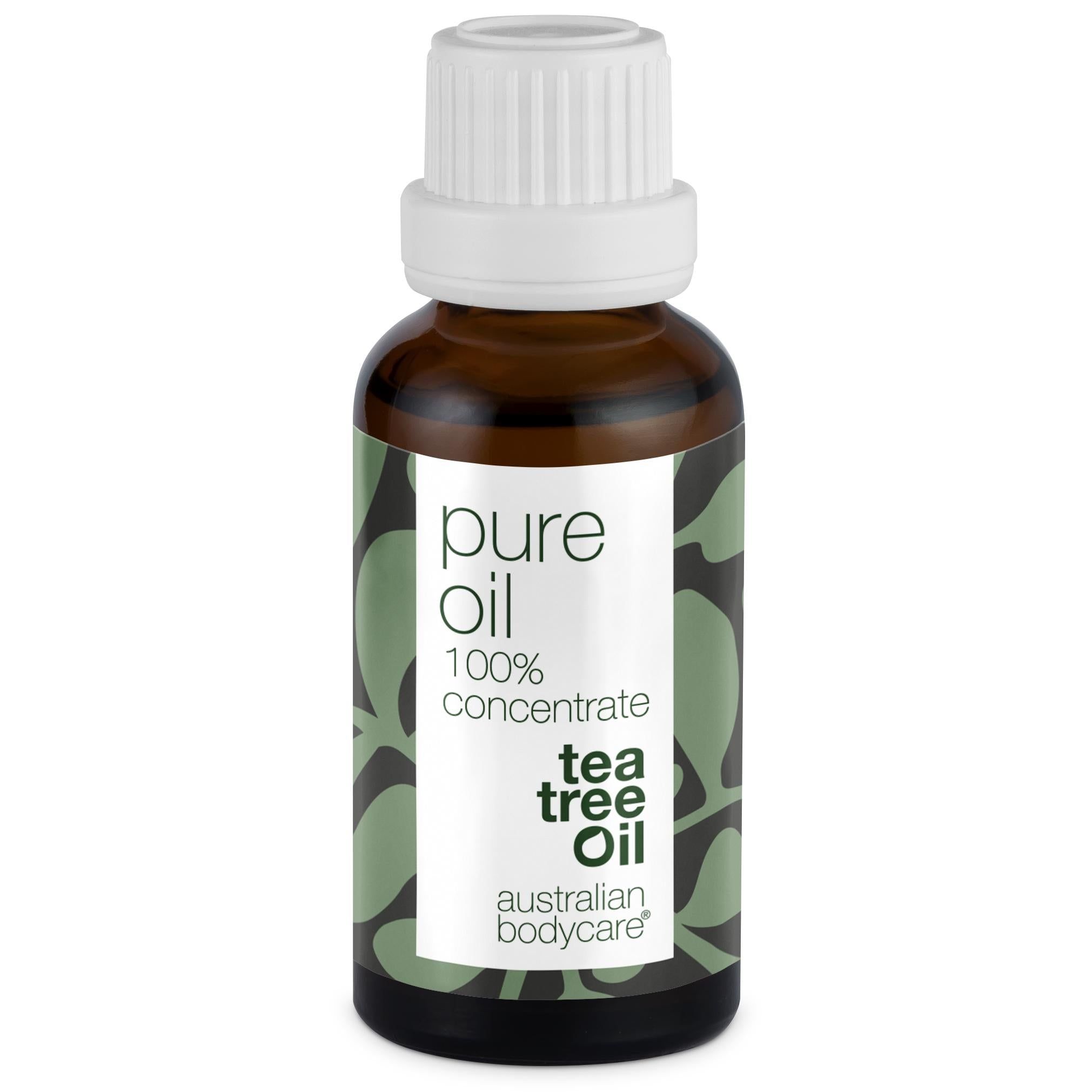 Braune Glasflasche mit weißem Deckel. Etikett mit Text: pure oil, 100% concentrate, tea tree oil, australian bodycare.