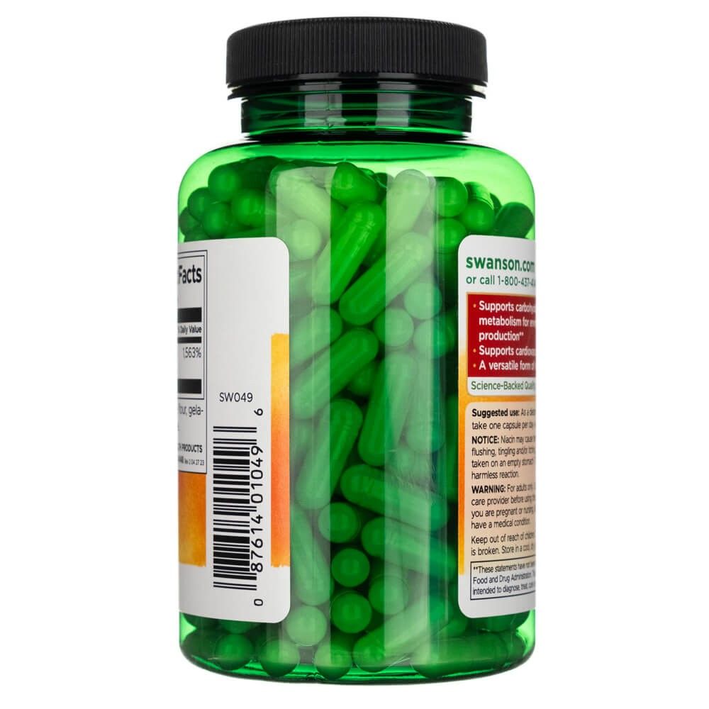 Transparente grüne Dose mit vielen grünen Niacinamid-Kapseln im Inneren.