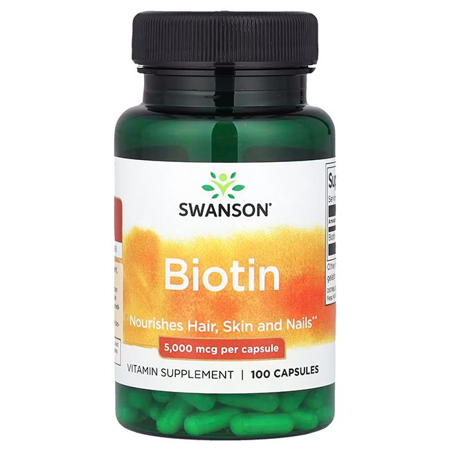 Grüne Kapseln in einer grünen Flasche. Aufschrift: SWANSON Biotin, 5.000 mcg pro Kapsel. 100 Kapseln.