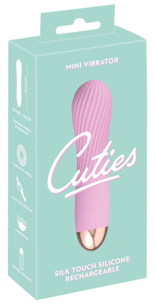 Verpackung eines pinken Mini-Vibrators mit gerillter Oberfläche und goldener Spitze.