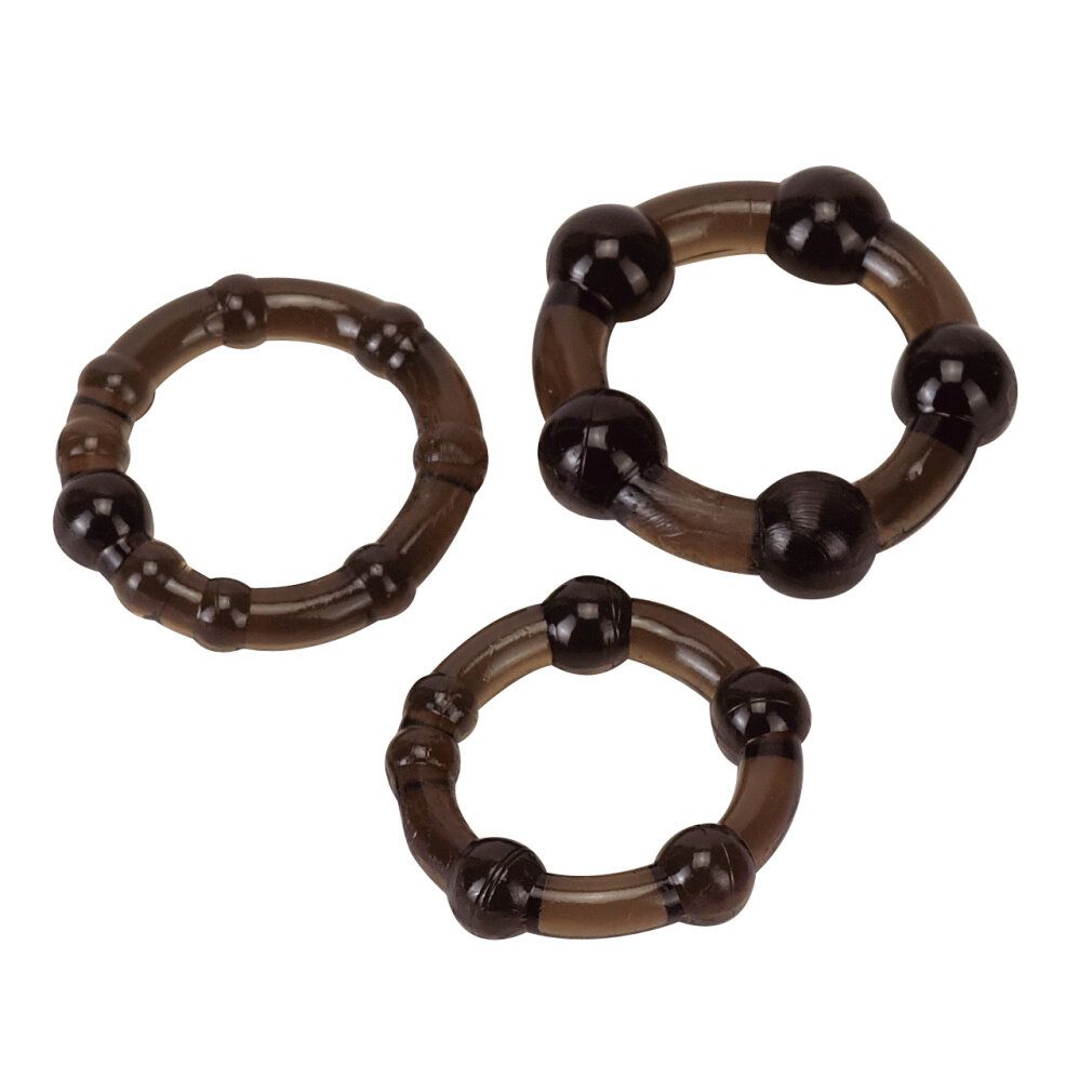 Drei schwarze Pro Rings in verschiedenen Größen mit Noppen.