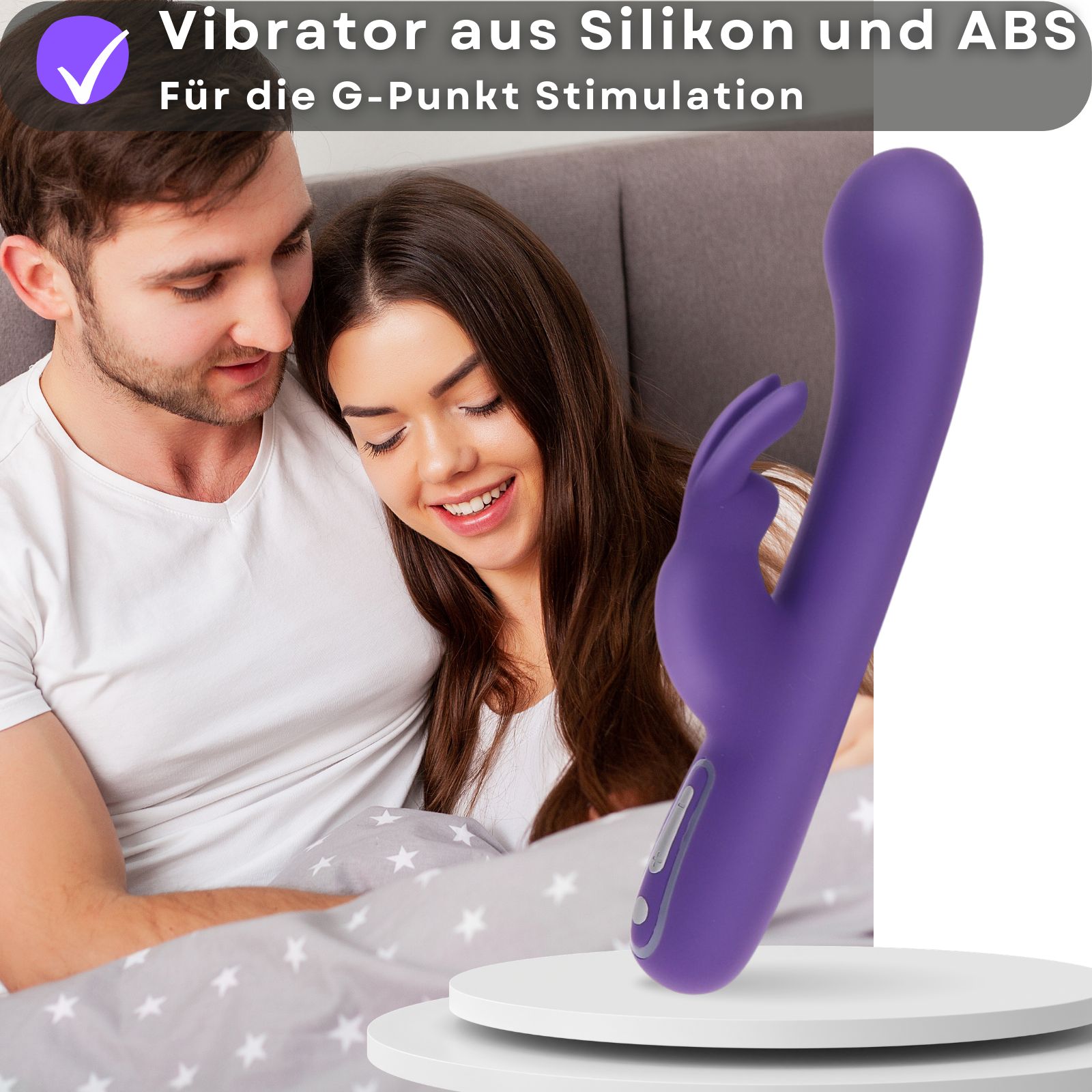 Lila Vibrator. Silikon und ABS. Für G-Punkt Stimulation. Paar im Hintergrund.