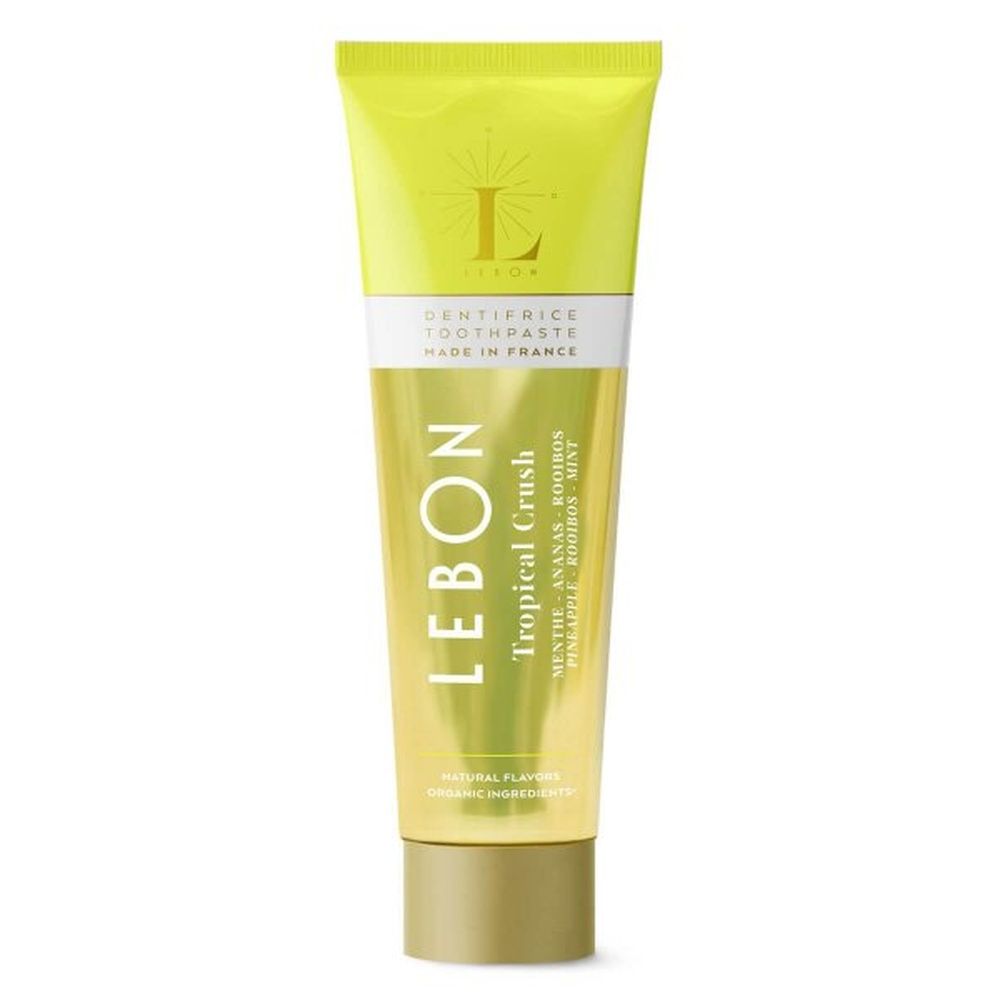 Gelbe Zahnpasta-Tube mit goldener Kappe. Aufschrift: LEBON, Tropical Crush, Made in France. Natürliche Aromen.