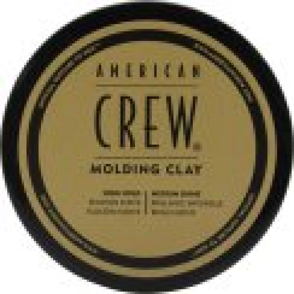Runde Dose mit goldenem Etikett und schwarzem Rand. Aufschrift: American Crew Molding Clay. Text in Englisch und Spanisch.