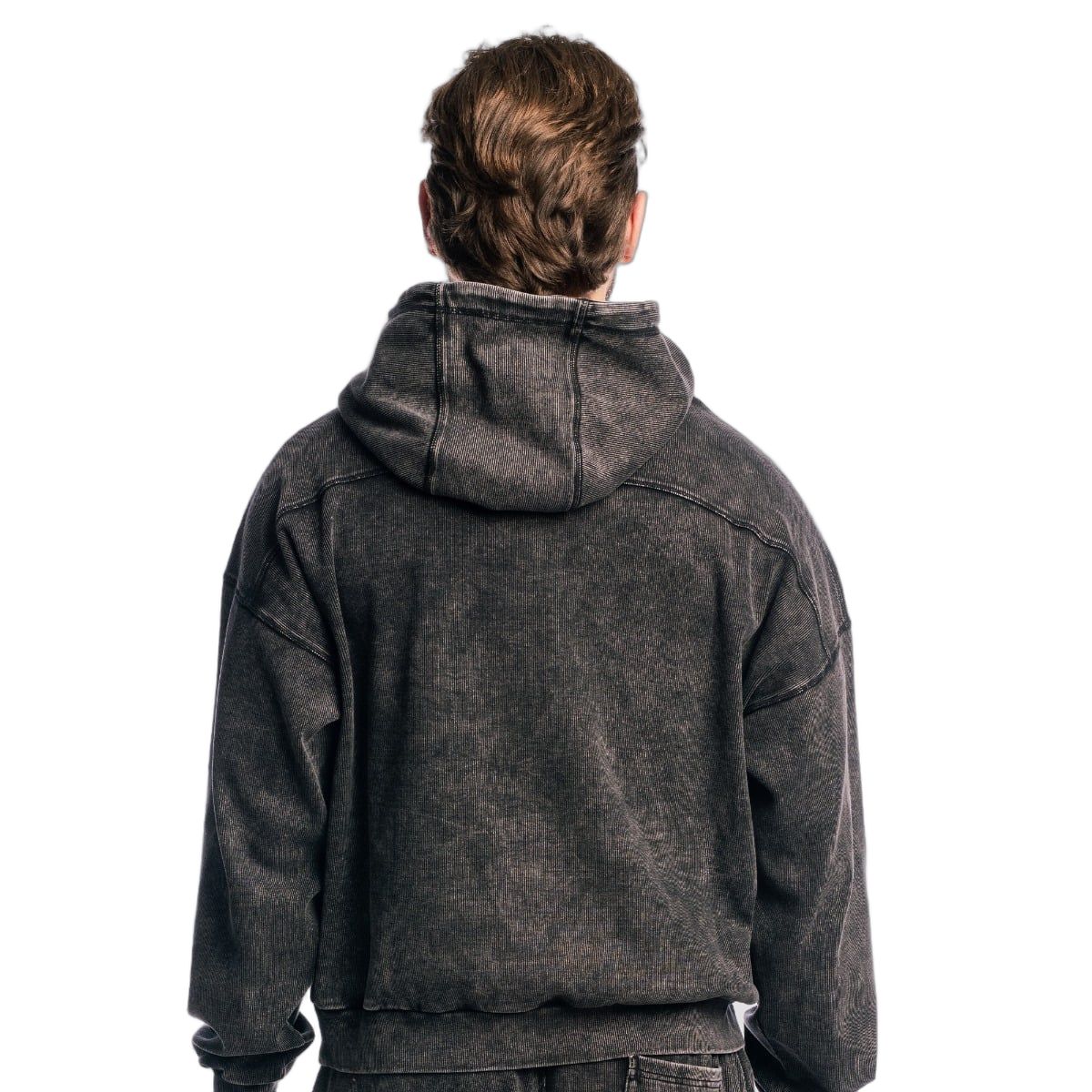 Rückansicht eines Herren Oversized Hoodies in verwaschenem Schwarz mit Kapuze.
