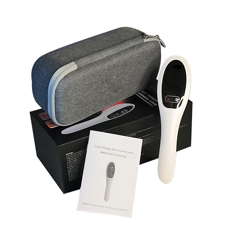 Das Gerät, eine schwarze Box, eine Bedienungsanleitung und eine graue Tragetasche. Das Gerät ist weiß mit einem Display.