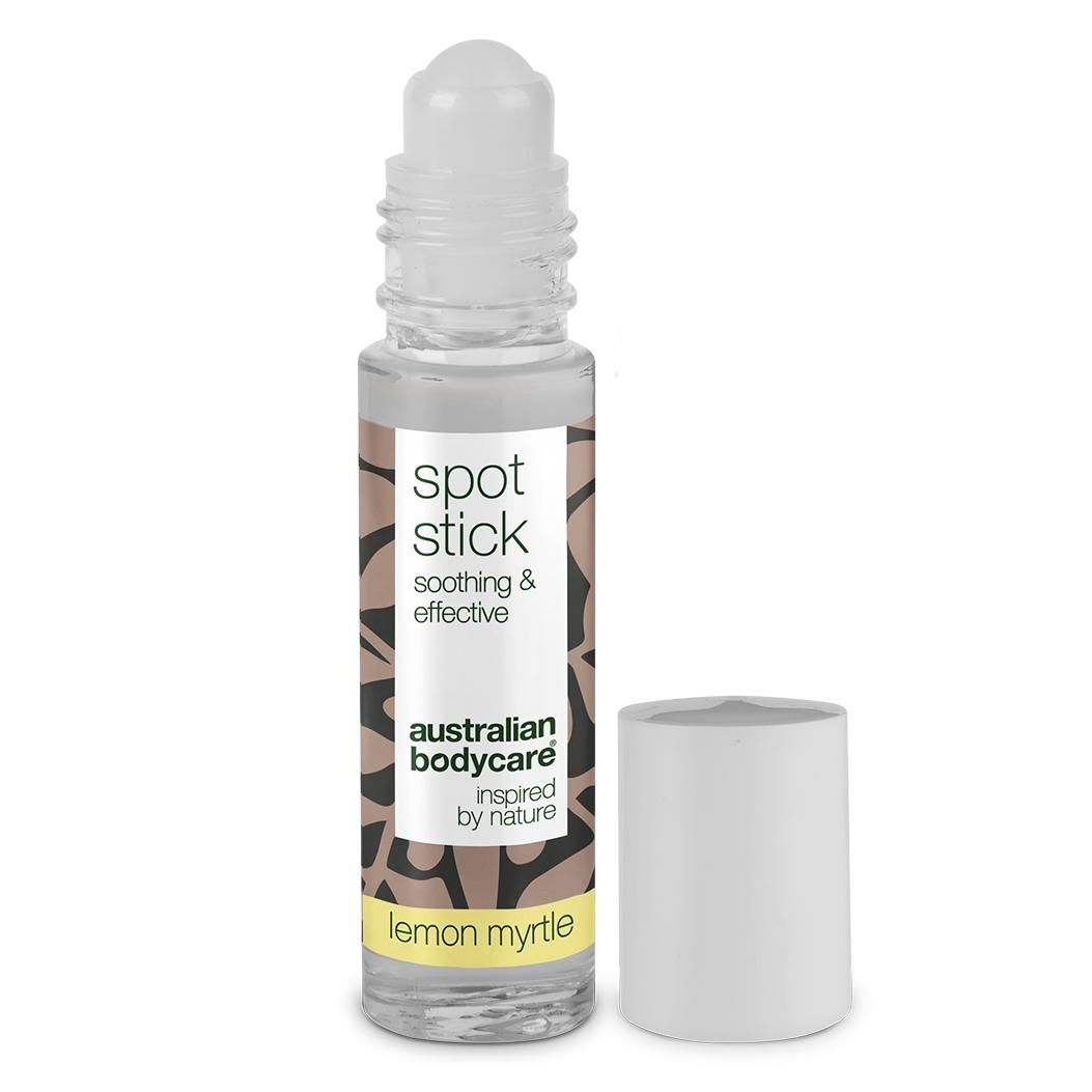 Klarer Spot Stick mit Roll-on-Applikator und weißer Kappe. Aufschrift: spot stick, australian bodycare, lemon myrtle.