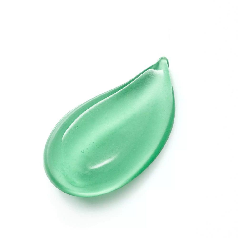 Klecks der Essence Jelly Grip Lidschatten-Base. Grüner, gelartiger Klecks auf weißem Hintergrund.